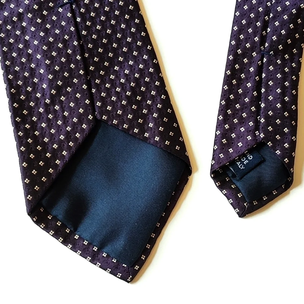 Purple and white patterned Italian silk tie